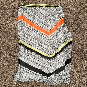 Black and white maxi skirt with tribal print and orange and green designs